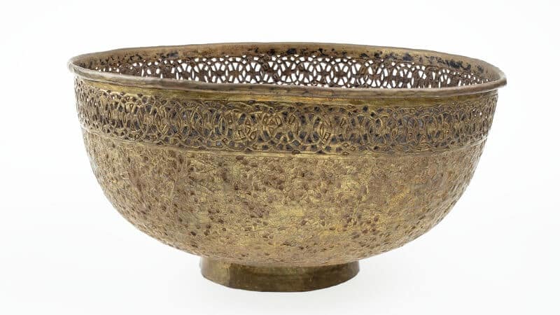 A brass bowl designed by Persian artisans on view in ‘Iranzamin’ a survey exhibition of Persian art at the Powerhouse Museum.
