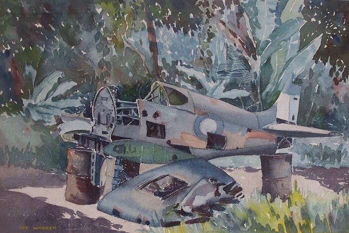 A watercolour on paper by Guy Warren depicting a crashed war plane in Bougainville in 1945. On view in 'From the Mountain to the Sky' at National Art School.